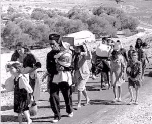 Palestiniens quittant la Palestine sous mandat Britannique en octobre-novembre 1948. Palestiniens quittant l'Etat d'Israël quelques mois après sa création (photo prise en octobre-novembre 1948). Fred Csasznik / Wikimedia Commons