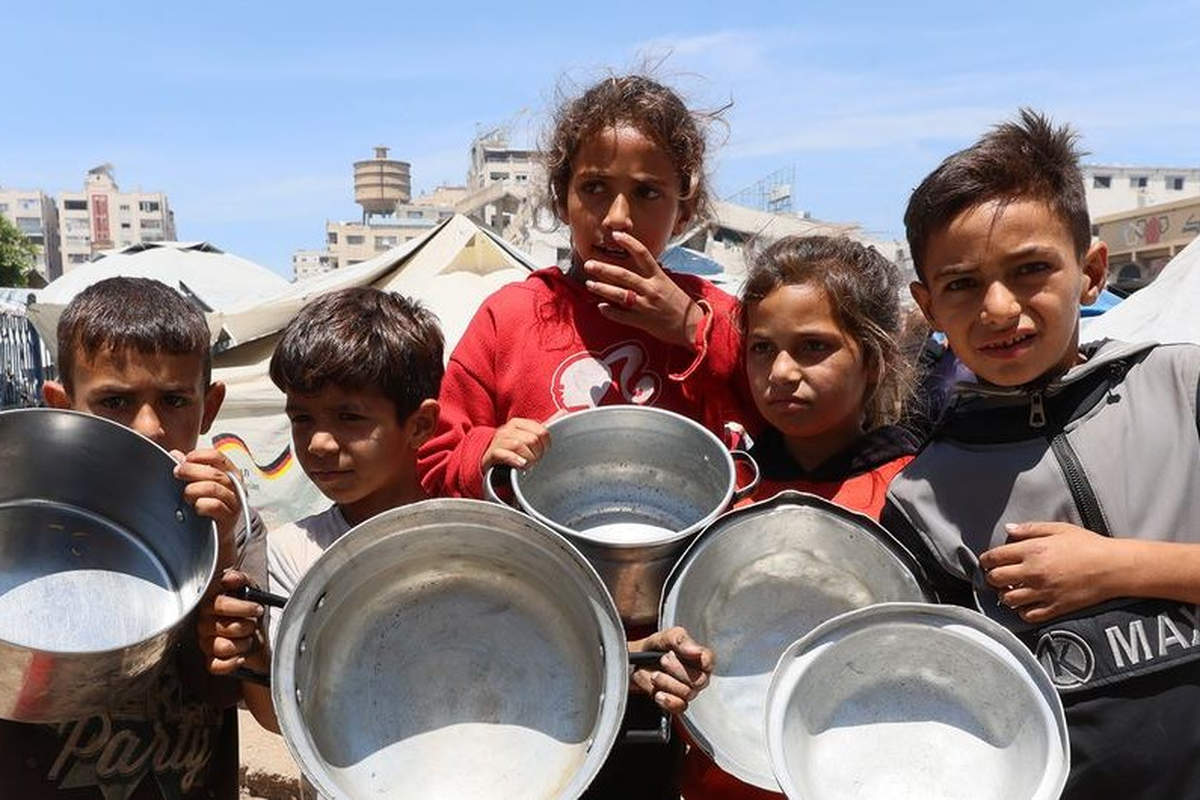 Famine à Gaza : des enfants attendent de la nourriture (Image ONU)
